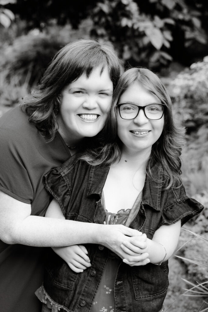 Carrie with her teen daughter at a garden in Settle